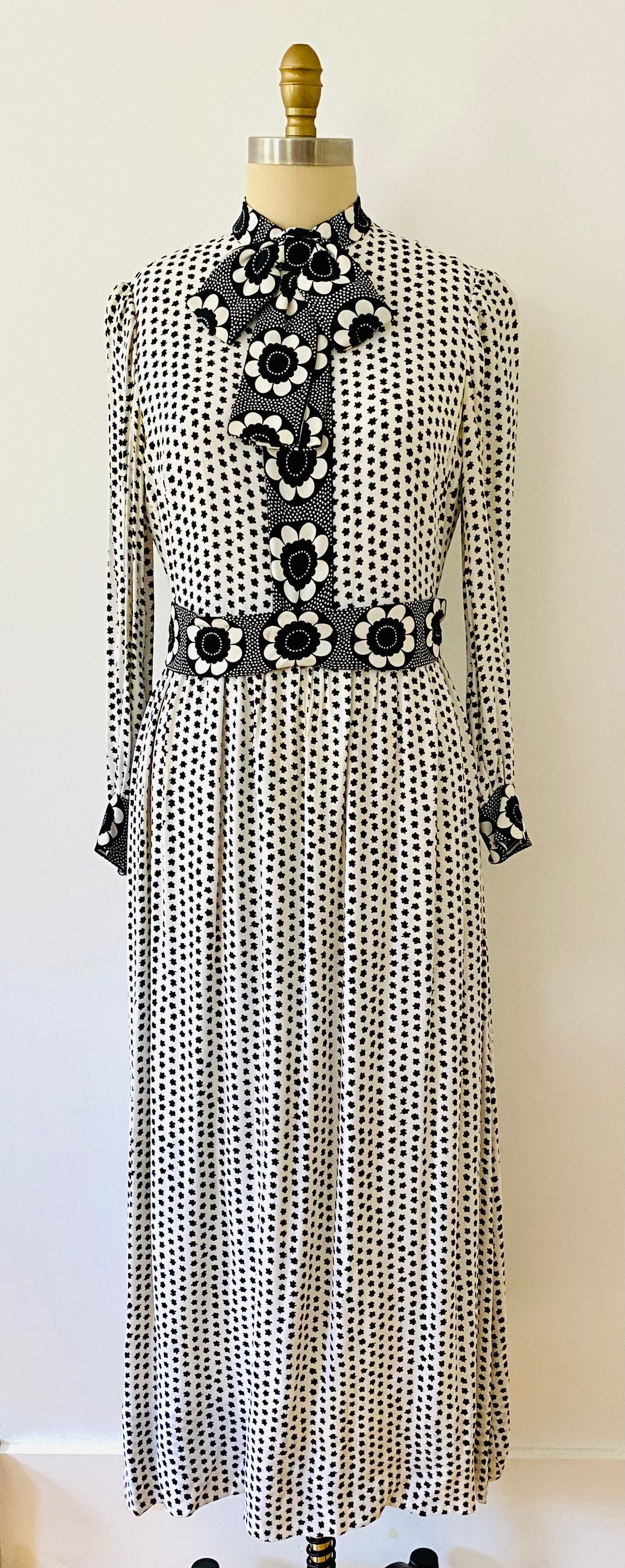 1960s vintage black and white polka dot long sleeve dress with bow